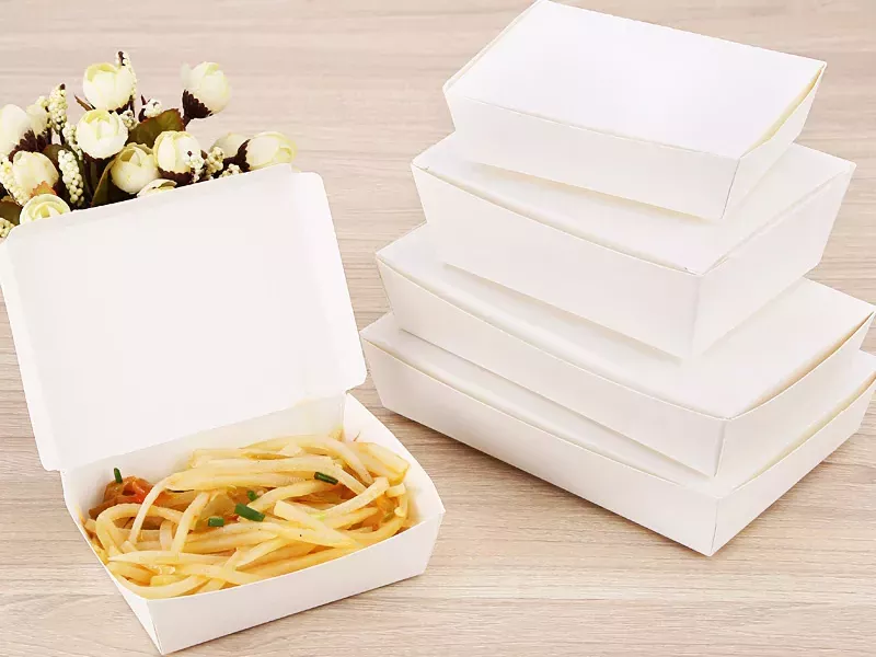 various paper made boxes with dividers for foods in white color